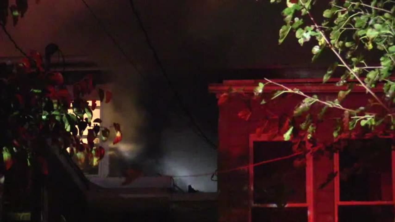 Crews battle row home fire in Allentown